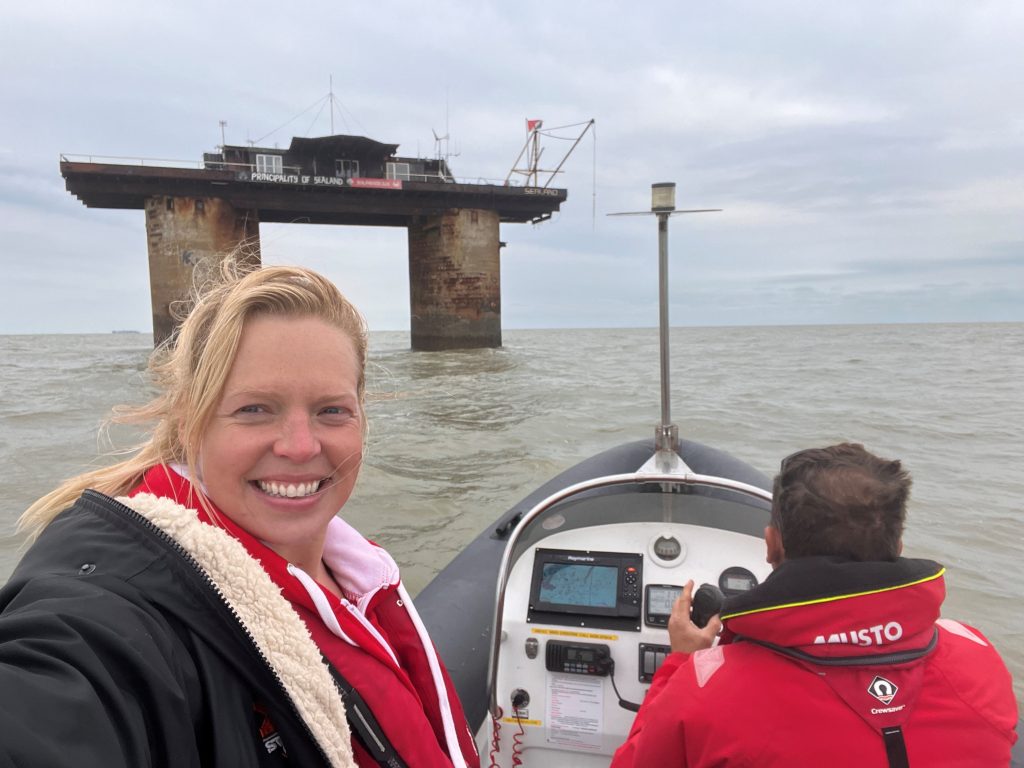 Swimming from Sealand for Aspire: Selfie of author in a small boat approaching the Sealand platform
