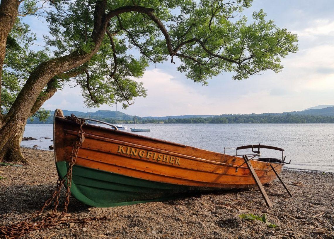 A rowing boat on the shore of Loch Lomond