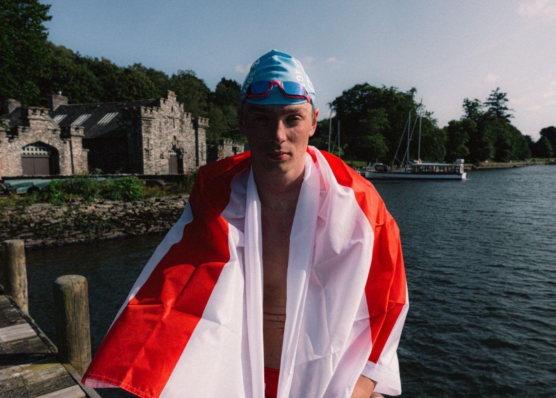 Hector, wrapped in a George Cross flag, looking exhausted after a swim