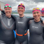 Swimmers preparing for the Great North Swim at Brockhole on Windermere